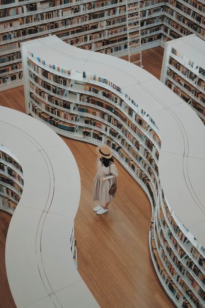 Woman in a bookstore library